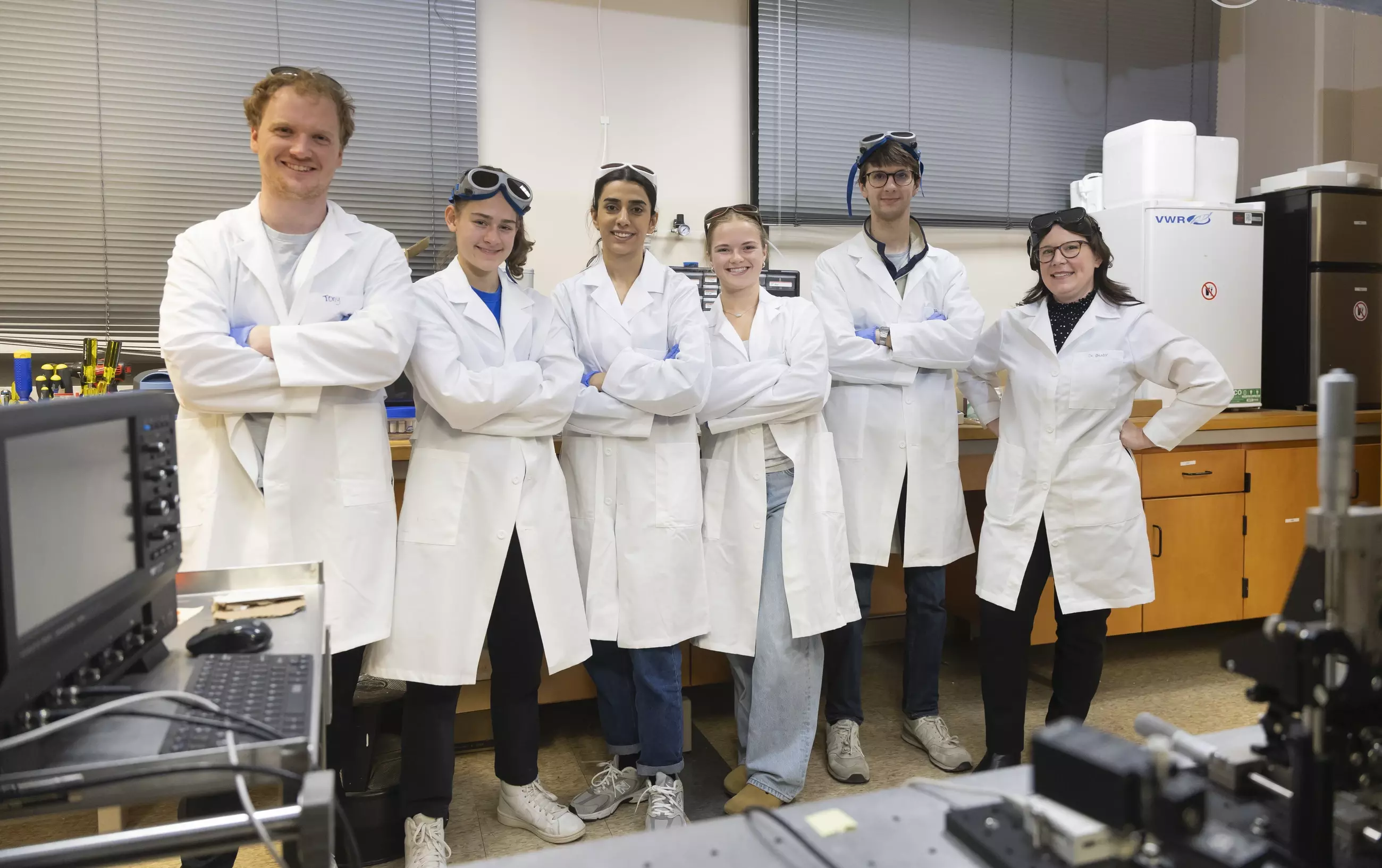 Image of Grady Lab members in lab coats